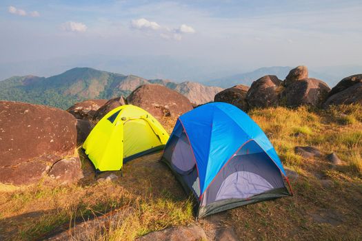 Set up a tent on the hill Full of grasslands