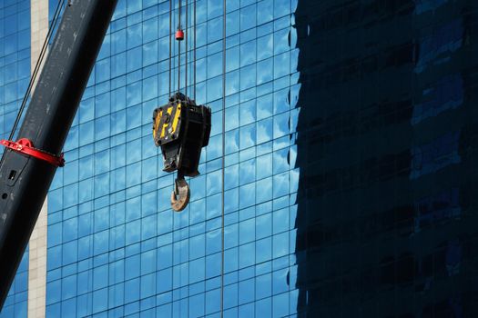 Construction crane With a background of tall buildings