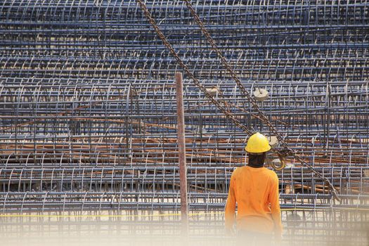 Construction worker And steel bars for tall building structures