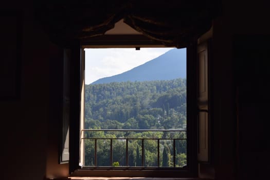 View of an ancient medieval village in the Tuscan countryside, Italy.