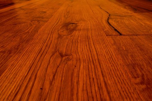 A closeup of a parquet floor with its natural veins.