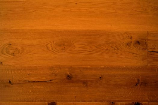 A closeup of a parquet floor with its natural veins.