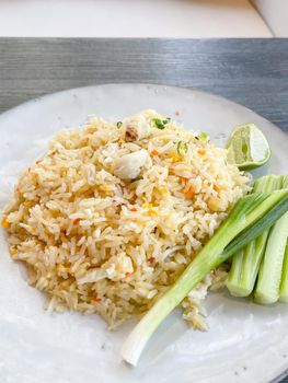 Fried rice on white plate, stock photo