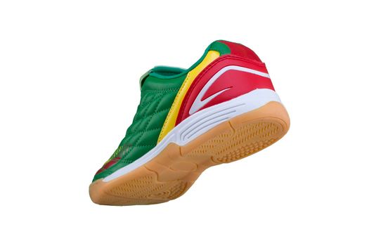 Sneakers green with color accents on a white sole with purple accents. Sport shoes on a white background.