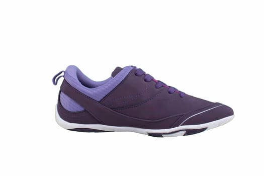 Sneaker purple on a white sole. Sport shoes on a white background.