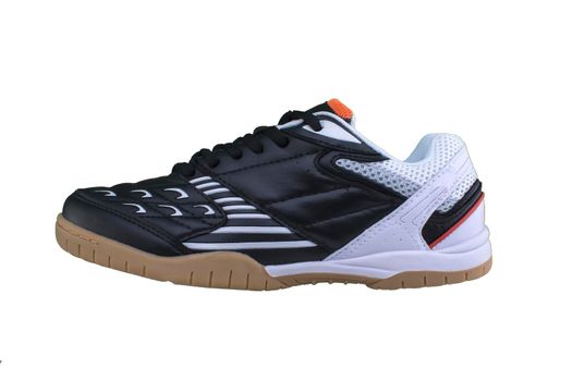Black sneakers with color inserts on a white sole. Sport shoes on a white background.