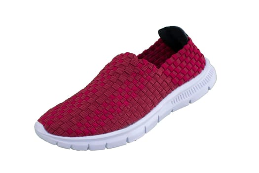 Red sneaker on a white sole. Sport shoes on a white background.