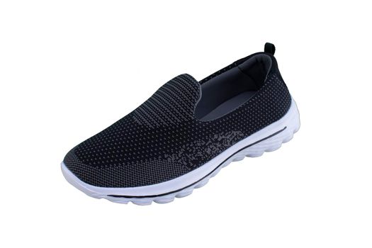 Black sneakers on white soles. Sport shoes on a white background.