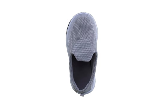 Sneaker gray on a white sole. Sport shoes on a white background.
