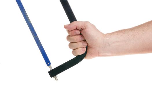 Hand holds a hacksaw on a white background, a template for designers. Close up