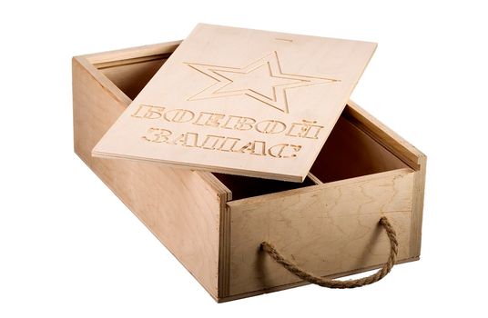 Wooden box with a lid on a white background