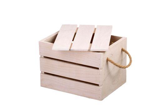 Wooden box with a lid on a white background. Storage box