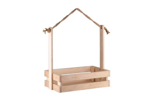 Wooden box with a rope handle on a white background. Storage box