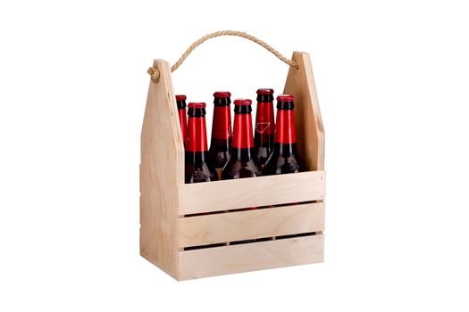 Wooden box with bottles on a white background