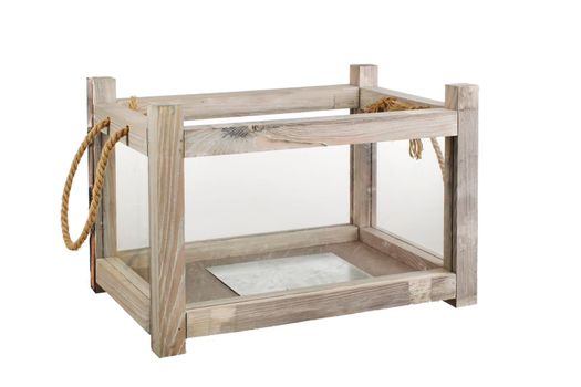 Wooden box with glass on a white background