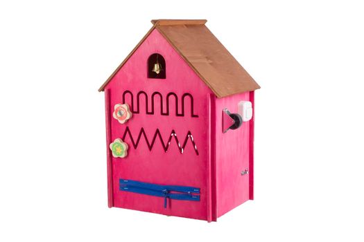 Educational wooden toy on a white background.Toy wooden house
