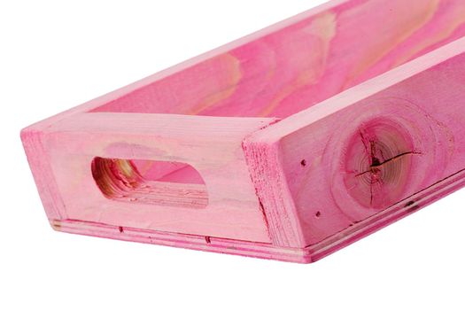 Fragment of a wooden box on a white background close-up