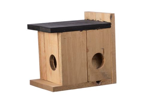 Wooden birdhouse on a white background