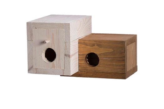 Wooden birdhouse on a white background