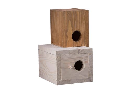 Wooden birdhouse on a white background