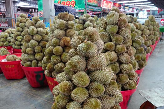 Basket full of durians at Talad Thai fruits market.