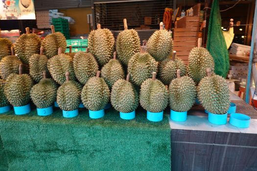 Basket full of durians at Talad Thai fruits market.