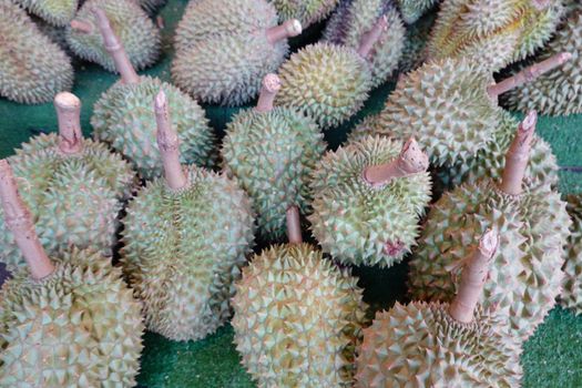 Basket full of durians at Talad Thai fruits market.