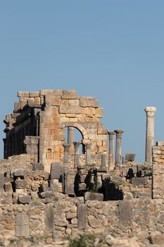 Volubilis is a site of Roman ruins and formerly a partly excavated Berber city in Morocco near the city of Meknes.The images show the ruined buildings and columns that are part of the large site High quality photo