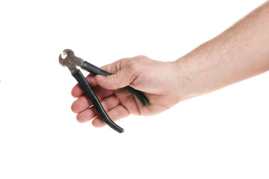Hand holds old pliers on a white background, a template for designers. Close up
