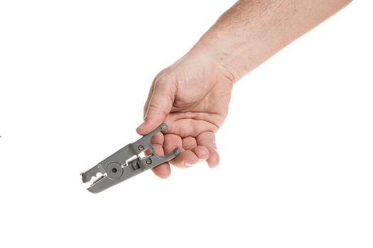 Hand holds a wire stripper on a white background, a template for designers.