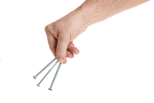 Hand holds metal screws on a white background, a template for designers. Close up