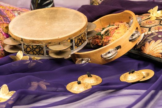 musical instruments of a bellydance percussiongroup with darbuka's, tambourines and zills