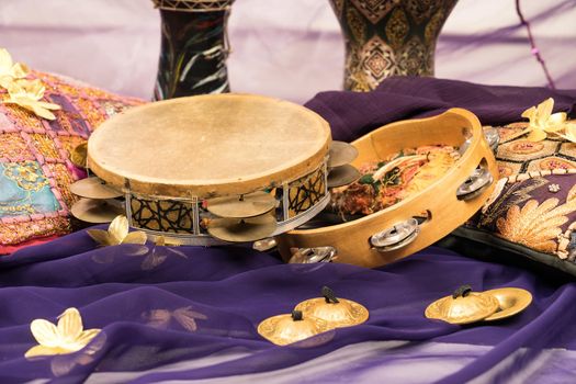 musical instruments of a bellydance percussiongroup with darbuka's, tambourines and zills