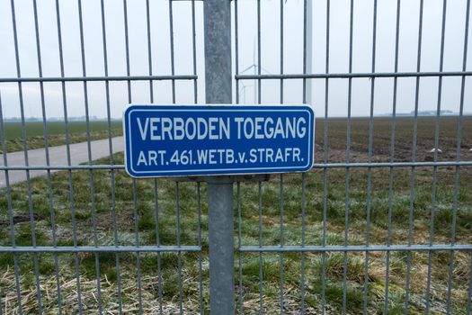 Sign no access no entry on a fence Dutch article 461 saying "entry prohibited, article 461 penal code"