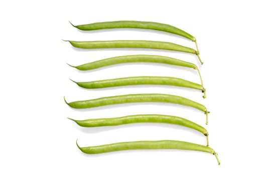 A handful of green beans isolated on a white background