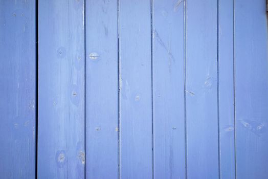 A Bright light lilac color wood plank texture. Vintage beach wooden background.