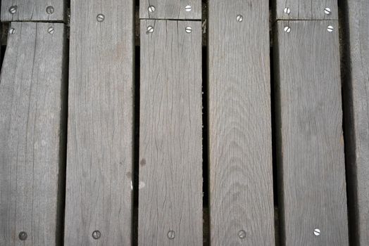 a Wooden planking or landing on a pier, background with structure and pattern use for copy space seen from above