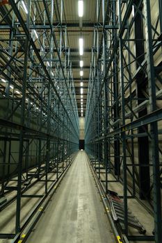 A perspective view of an old warehouse rack in green