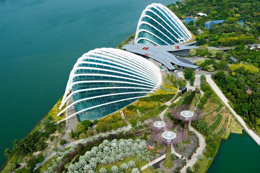 Singapore - November 11, 2017 : Skyline view of the Singapore Gardens by the bay, Flower dome and Cloud Forest facing the Ocean during day