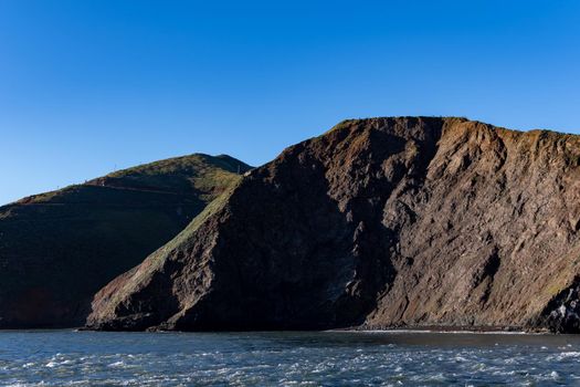 Island scenic of brown island from the san francisco bay near Alcatraz island. Panoramic shot of island and Sea from the Pacific Ocean