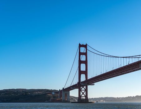 Famous Golden Gate Bridge in San Francisco California USA. The Golden Gate Bridge is a suspension bridge spanning the Golden Gate connecting San Francisco bay and pacific ocean