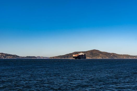 Container ship while cruising the pacific ocean near San Francisco Bay, San Francisco CA USA, March 30, 2020