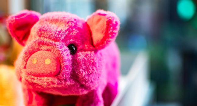 Red pig stuff toy. Cute stuff toy of a piggy red color