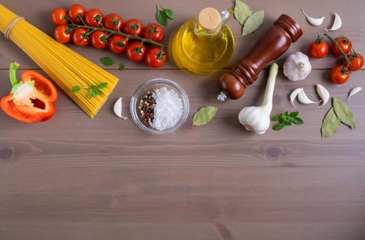 Close-up top view of ingredients for making Italian pasta. Healthy and wholesome food concept. Selective focus. Copy space.