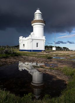 Point Perpendicular Lighthouse reflected in the pond.
New South Wales, Australia.
