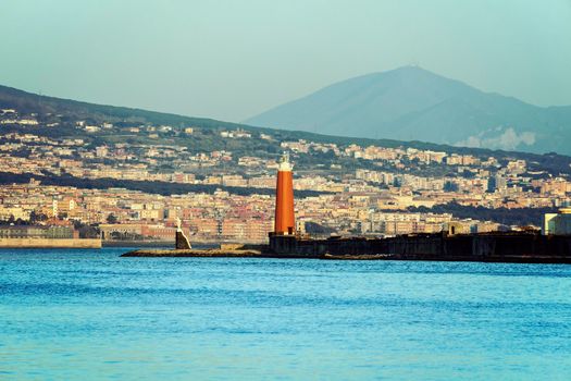 Naples lighthouse and Mt Vesuvius. Naples, Campania, Italy.