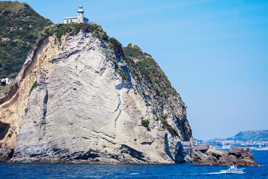 Capo Miseno Lighthouse on the cliff. Miseno, Campania, Italy