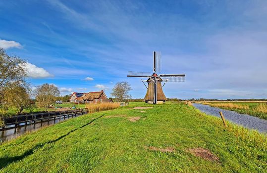 Oudkerker windmill in the countryside from the Netherlands