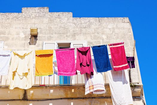 Laundry on the balcony - Sassi in Matera. Matera, Basilicata, Italy