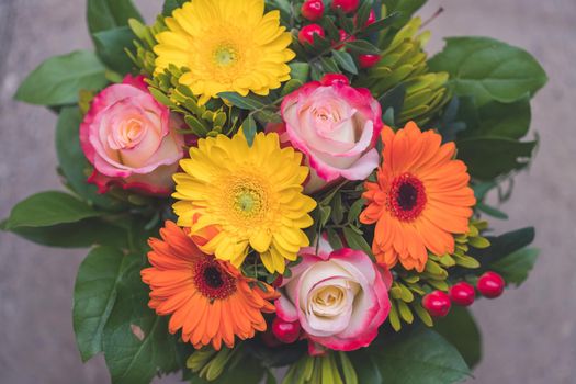 Close up of spring flower bouquet with gerbera and roses